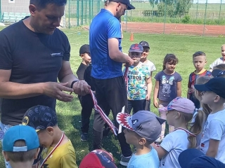 gr. V wreczenie dzieciom medali z z Olimpiady