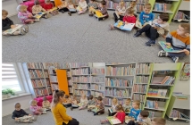 Pani Bibliotekarka pokazuje Sowkom dzieciece zbiory zgromadzone w bibliotece